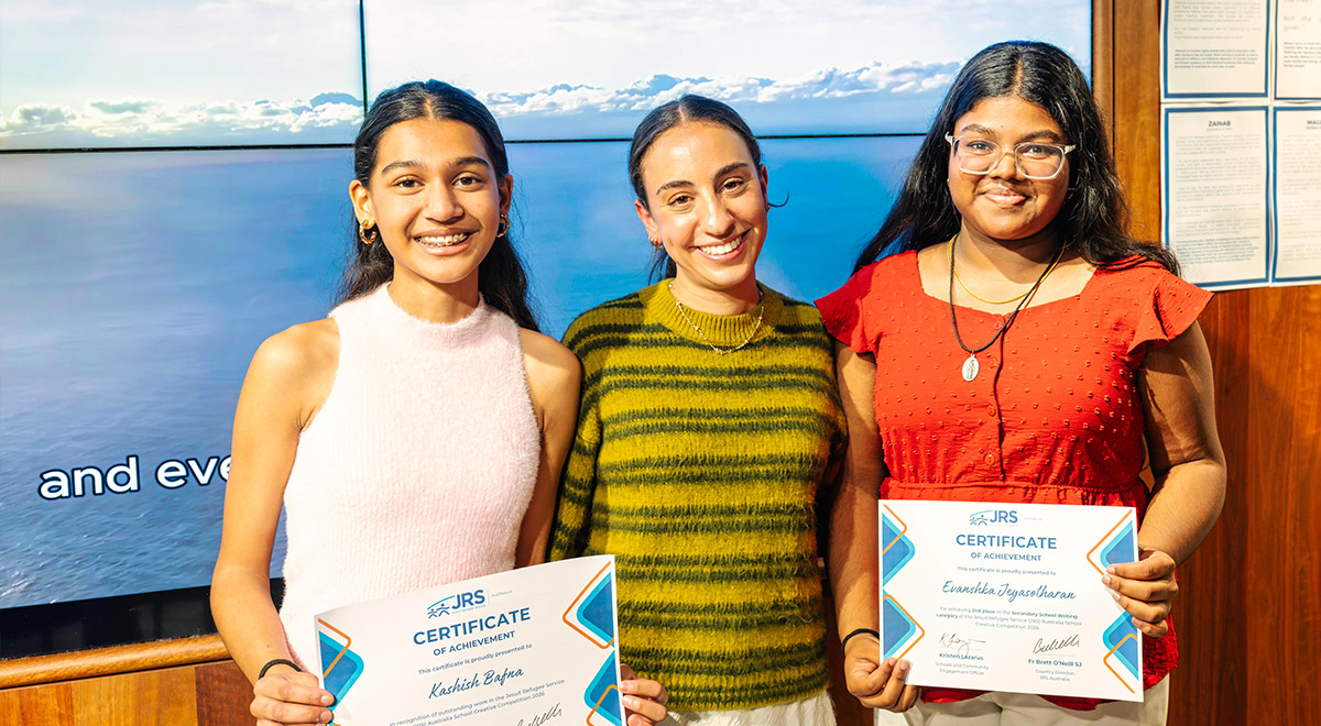 Photo: JRSβs Kristen Lazarus (centre) with award recipients Kashish (L) and Evanshka (R)